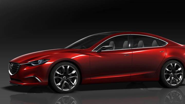 Side Pose Of Mazda Takeri Concept Saloon In Red